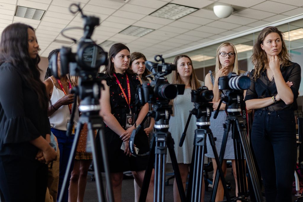 Fellows practice camera technique at a training exercise during the second week of the summer project in Phoenix. (Justin Parham/News21)