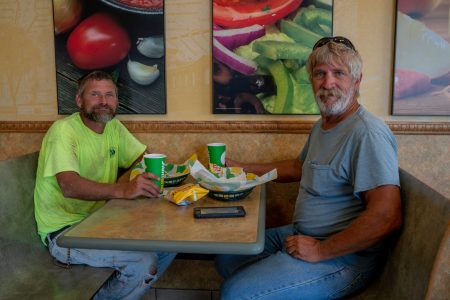 Frankie McCandless (left) and Keith Terwillger are constructions workers from Tennessee working in Tekamah, Neb. “Too many people are crying and moaning about every little thing,” Terwilliger said. “Everybody is just too tender. Everything upsets everybody.” (Lenny Martinez Dominguez/News21)