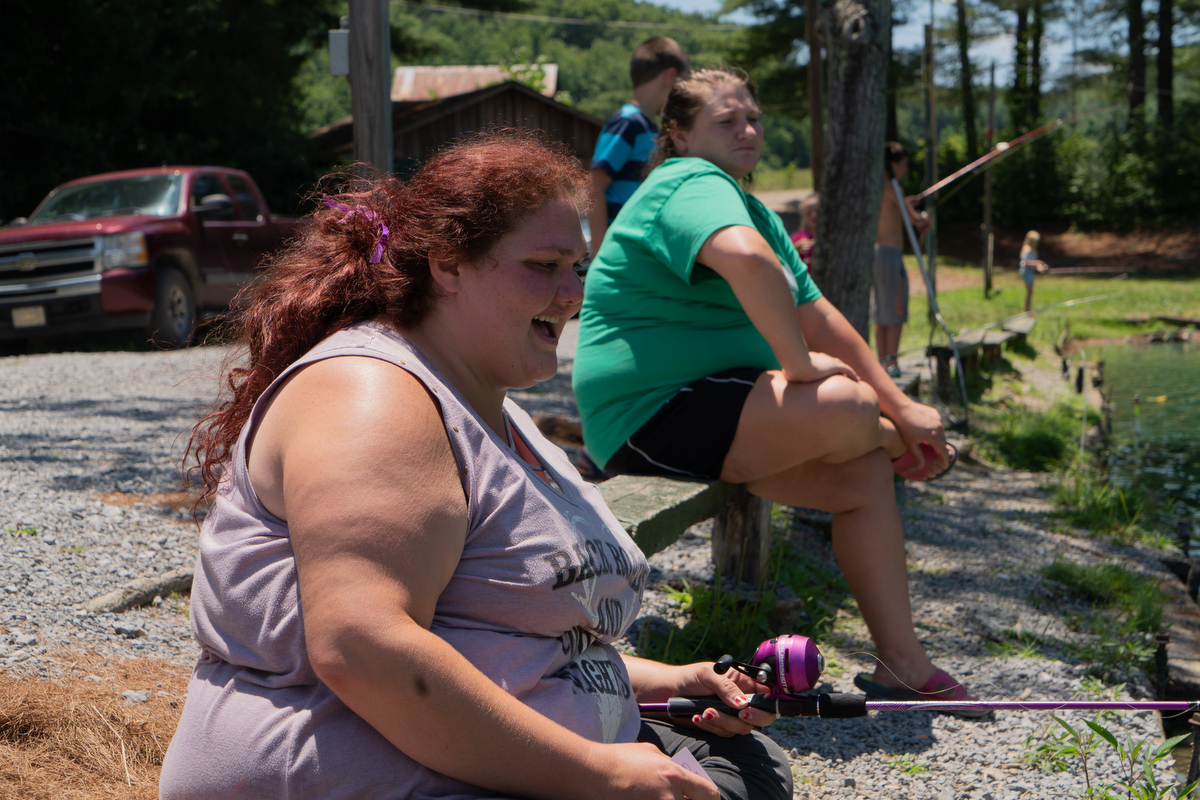 Jessica Vance of Beckley enjoys bonding with her children over fishing at Brandy's Catfish Pond near Bolt, West Virginia. (Tilly Marlatt/News21)
