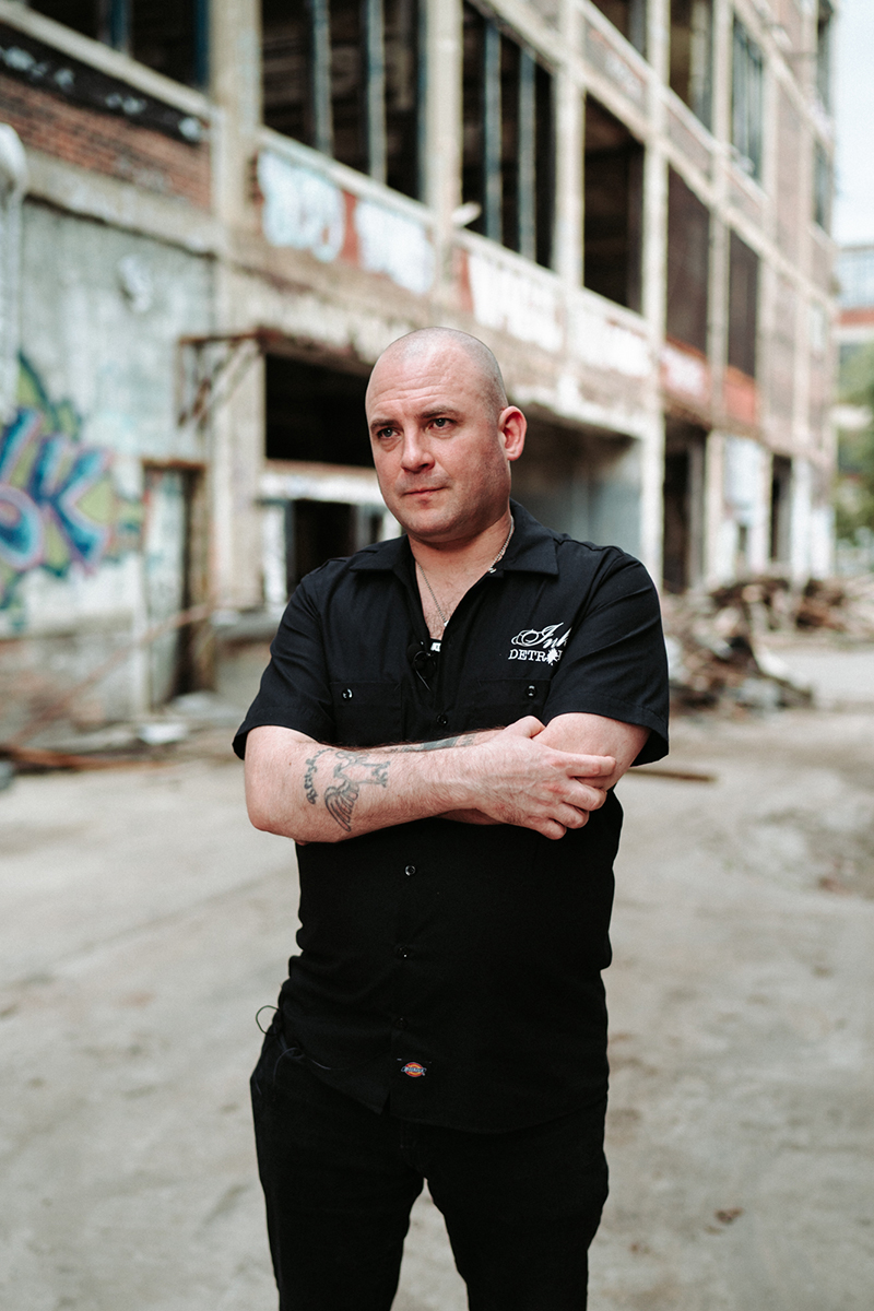 Jeff Schoep, commander of the National Socialist Movement, walks through the historic Packard Automotive Plant in Detroit. Schoep said the National Socialist Movement exists to protect the survival of the white race. (Megan Ross / News21)