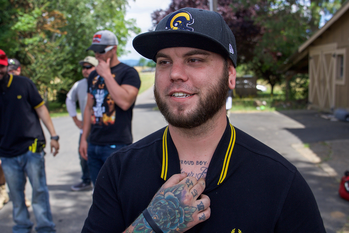 The Proud Boys requires members to get the organization’s name tattooed on their bodies as the third degree of initiation into the group. Jake Farmer shows off his Proud Boys tattoo. (Rosanna Cooney/News21)